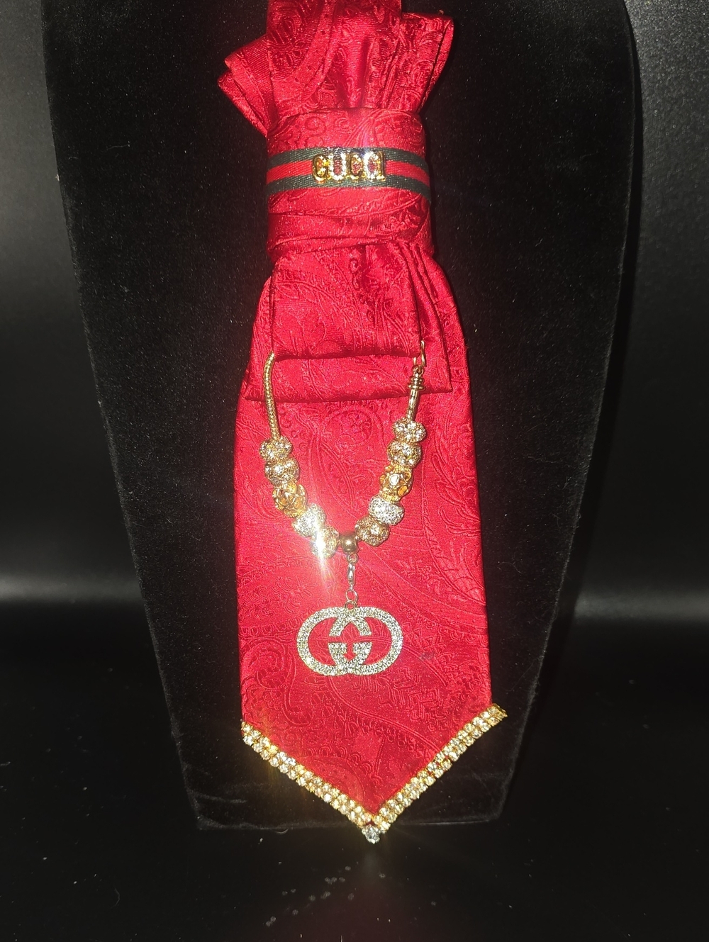 Gold Logo Pendant Necklace with Red Accents